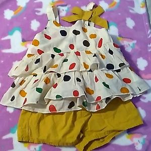 Two piece polka dot top and yellow bottom size 18-24 months